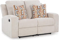 Signature Design by Ashley Danum Modern Tufted Manual Reclining Loveseat with 2 Accent Pillows, Beige