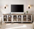 WAMPAT Farmhouse TV Stand for 100 Inch TV, Glass Wooden Universal TV Stand with 3 Storage Cabinets, Entertainment Center for 75/80/85/90 Inch TV, Console Table for Living Room, Bedroom, Rustic White